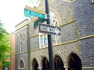 Portland Humor: that is a the face of Christopher Walken on that ONE WAY sign. On a side note, check out that stained glass.