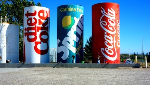 A gas station in Osgood, WY had these beautifully painted popcans. I just kept wondering about the dentist bill for the person who claims these cans.